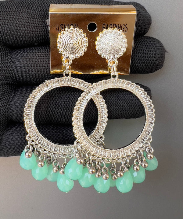Round silver light green jhumkas